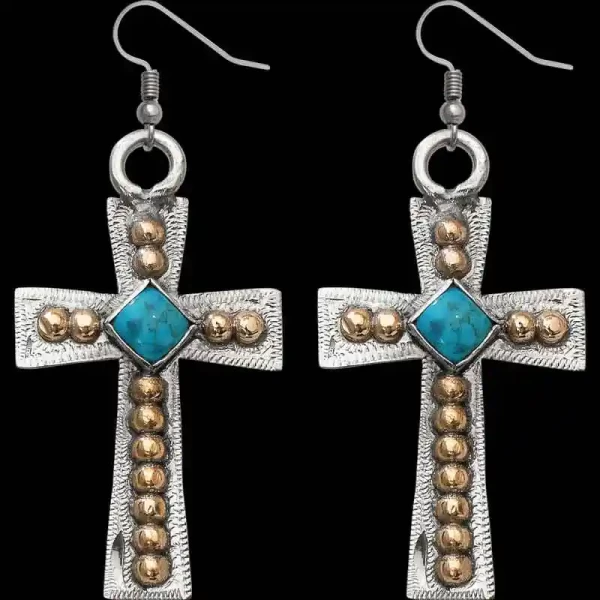 "This stunning set of Cross Earrings are crafted on a hand engraved, German silver base with a simple edge to show off the beauty of detailed scrolls.  .5"" x 1.5""

Browse more Western Jewelry by clicking Custom Bracelets and C